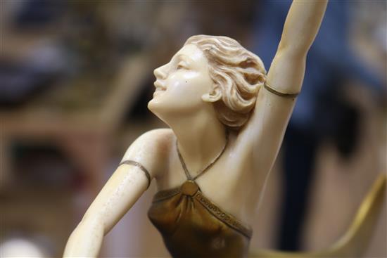An Art Deco bronze and carved ivory figure Butterfly dancer, by Prof Otto Poertzel width 26cm height 34cm, replacement base